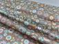 Preview: Quiltstoff aus der Serie Doodle Days mit Kreisen und Blumen auf taupe farbenen Untergrund von Makower